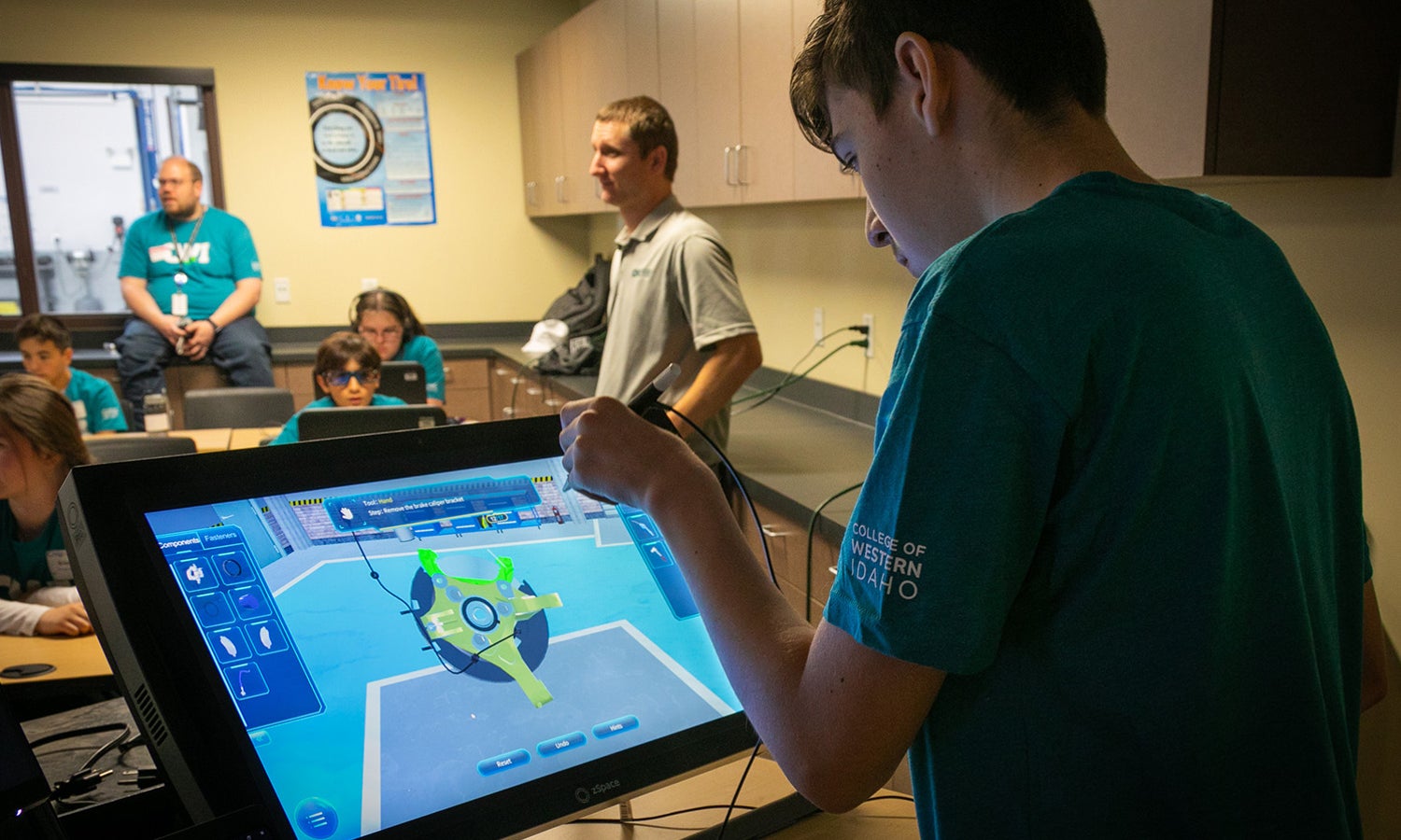 Student working on touchscreen in classroom setting